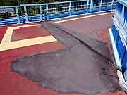 東北地方太平洋沖地震による清新町の液状化現象被害の様子<br />(東京都江戸川区清新町 2011年7月9日)